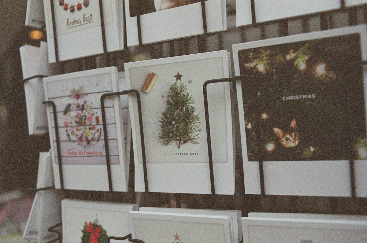 Christmas cards displayed on a wall in a festive British home
